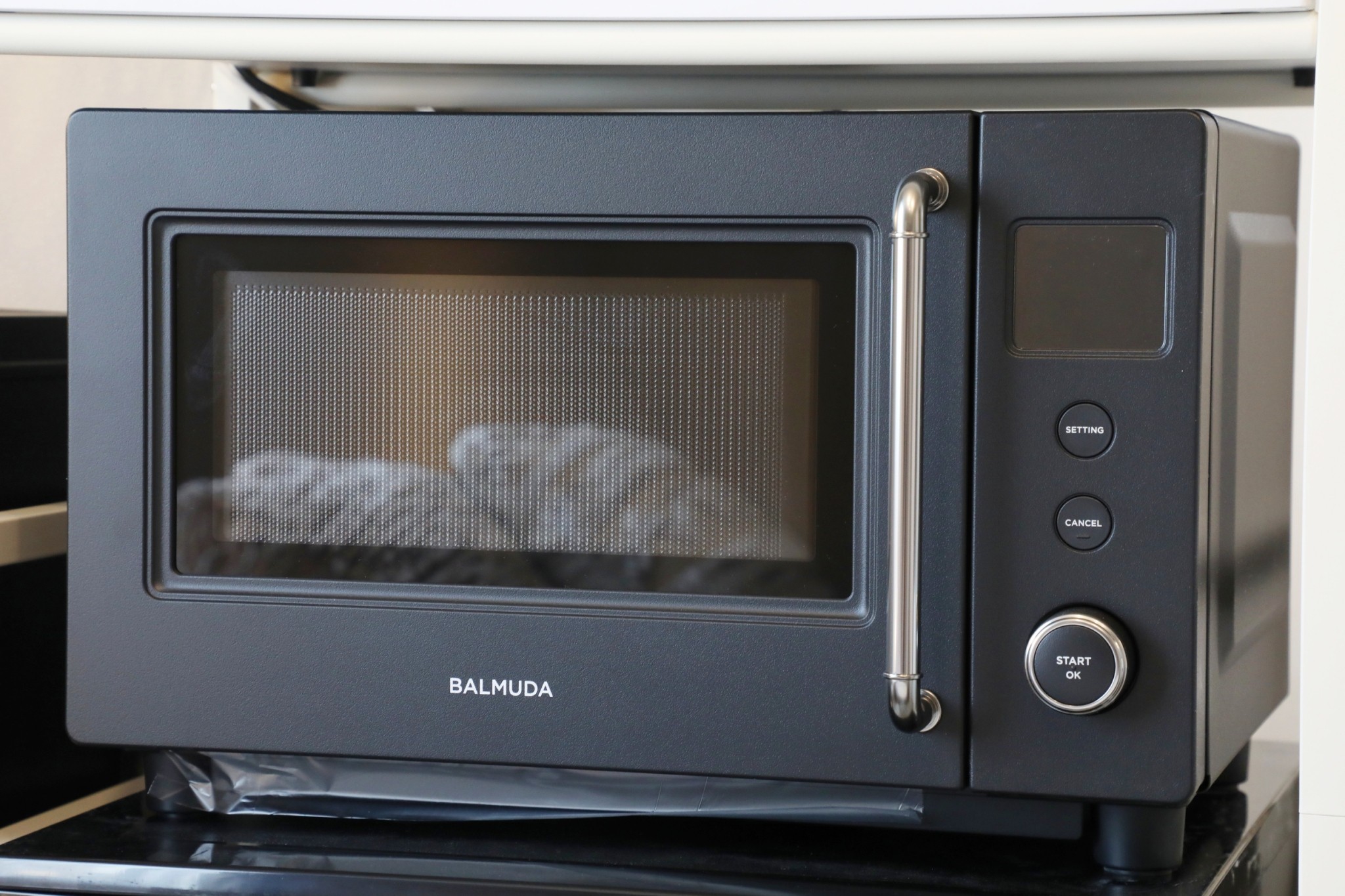 Room 103 BALMUDA microwave on shelf